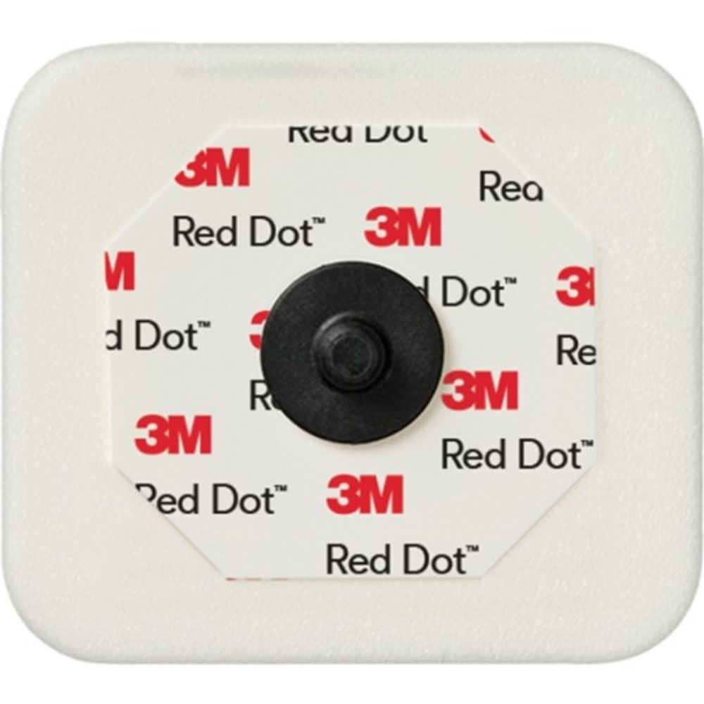 Electrodo radiolúcido 2570: envase con etiqueta Red Dot y disco negro central.