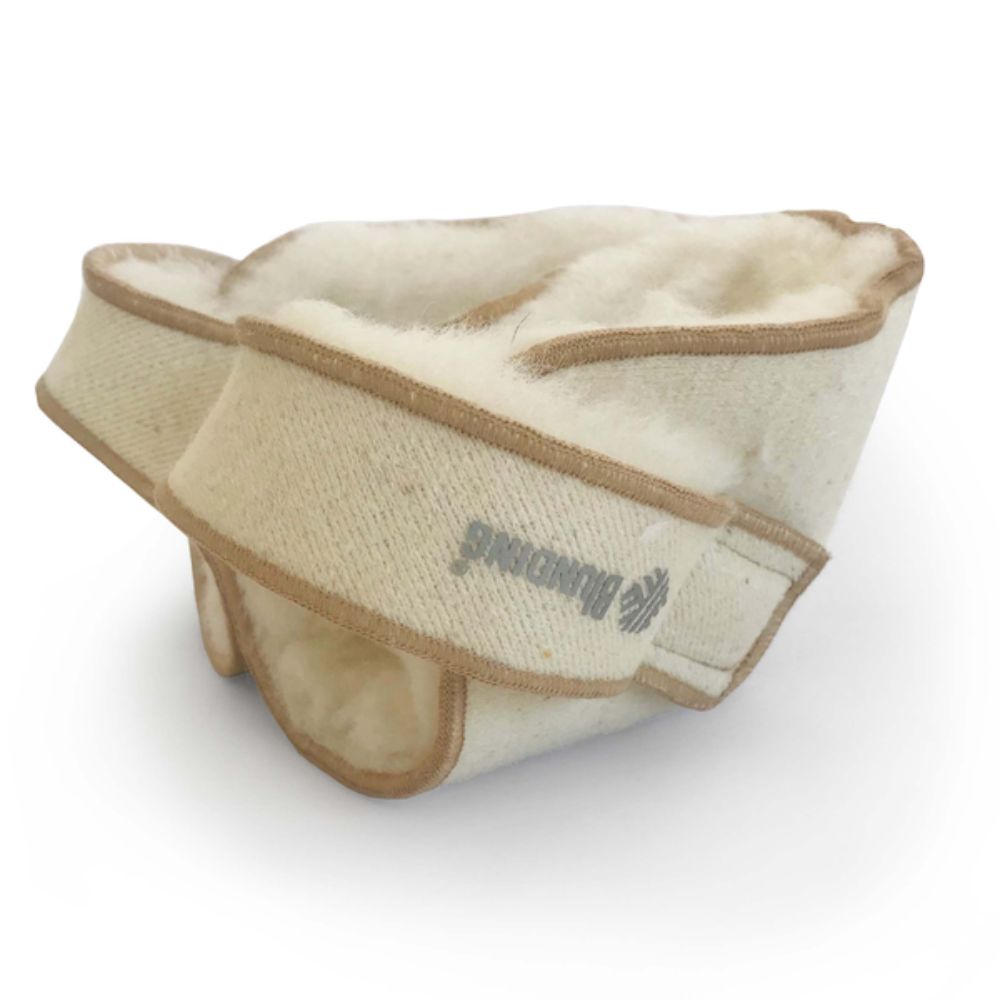 Talonera antiescaras de lana 100%, beige, con banda elástica de contorno.