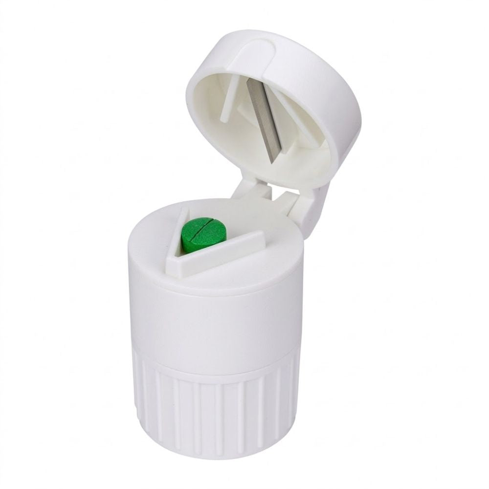 Cortador y moledor de tableta de plástico blanco, con compartimento abierto y pieza verde