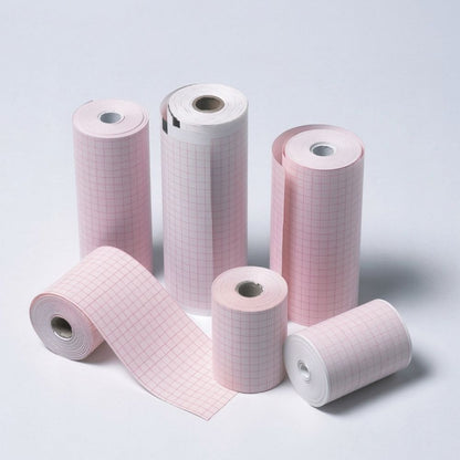 Papel rollo ECG en rollos blancos y rosados con cuadrícula