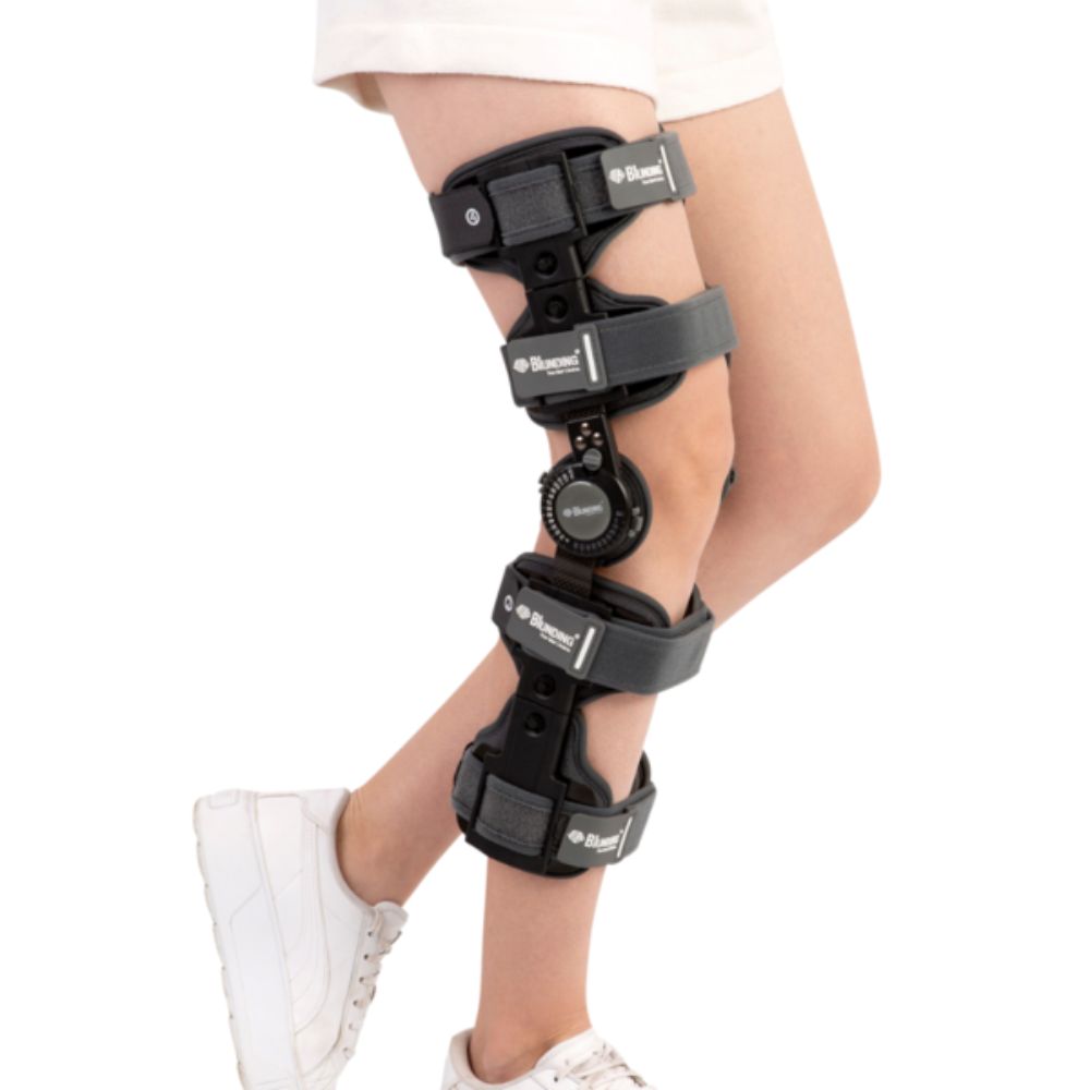 Ortesis de rodilla telescópica Blunding negra con bandas y bisagra