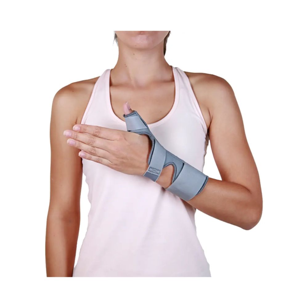 Inmovilizador de dedo pulgar HM-115 con férula azul, sujeto en el brazo y mano