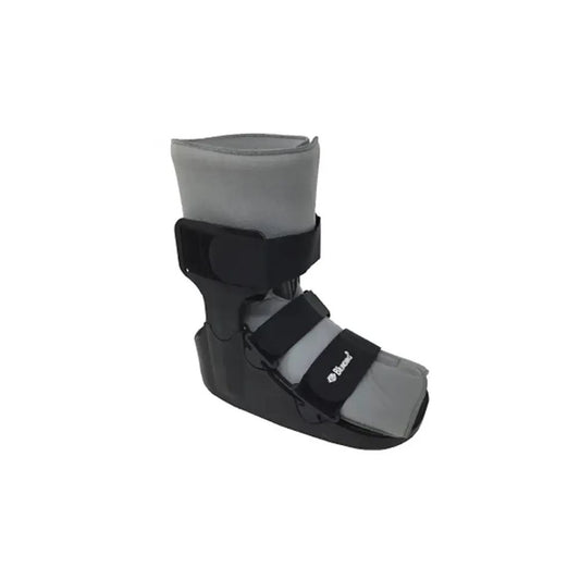 Bota inmovilizadora corta MI155, cierre velcro y refuerzo rígido, color oscuro.